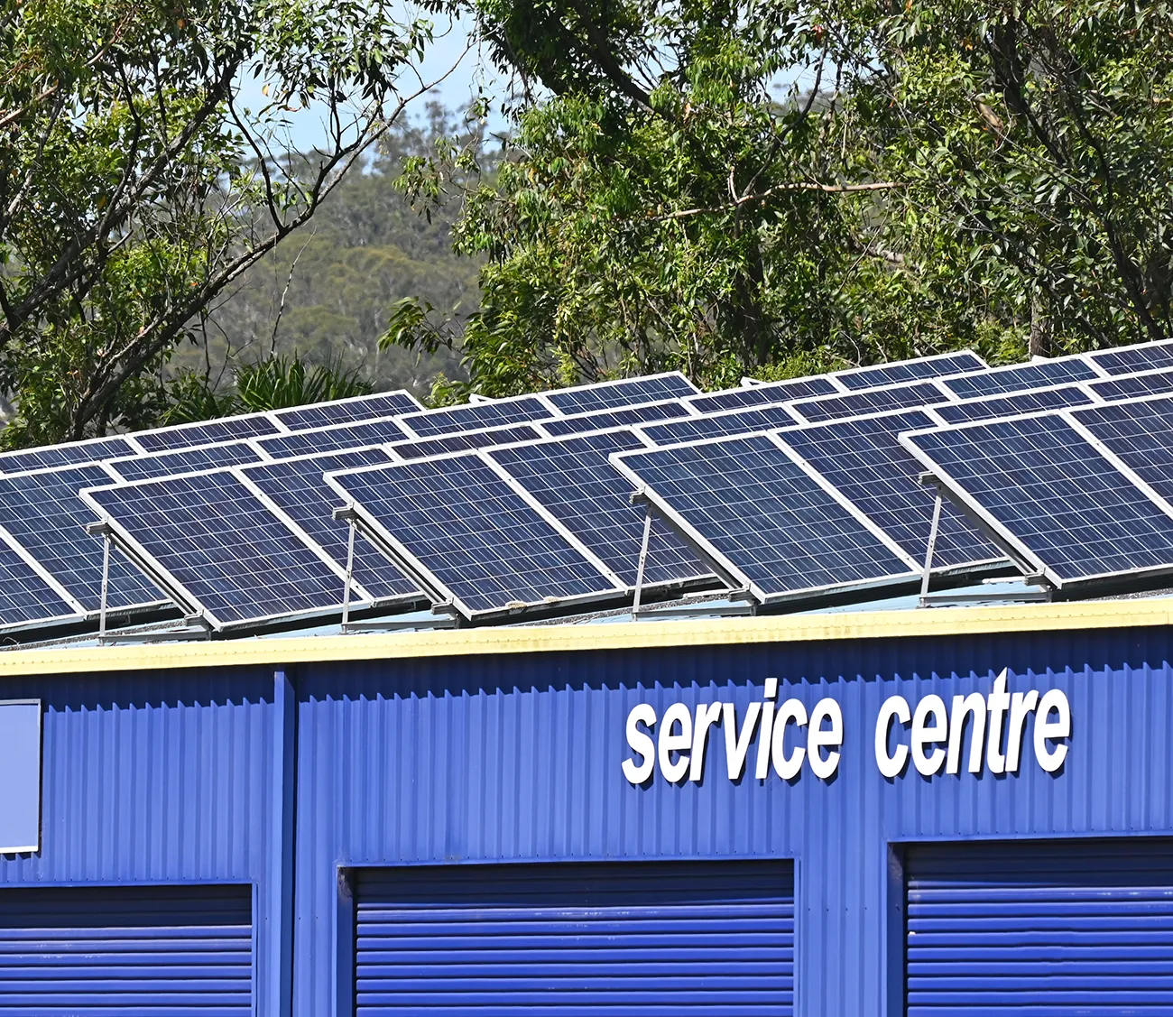 Solar panels on a roof in a commercial setting