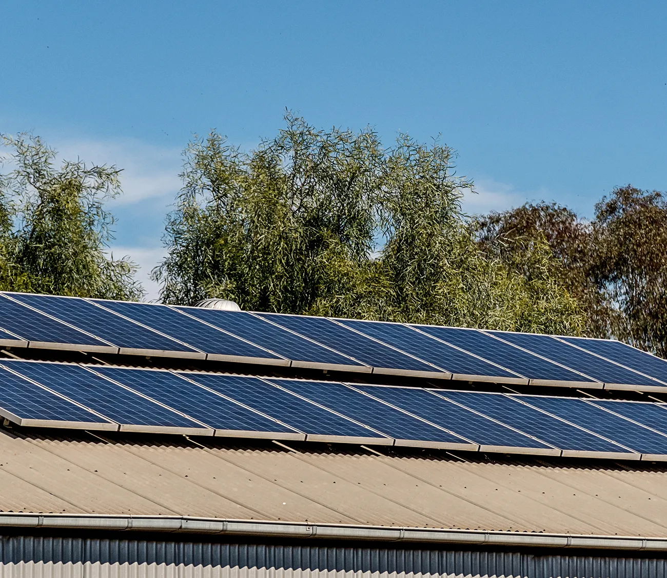 Solar panels on the roof of industrial building warehouse